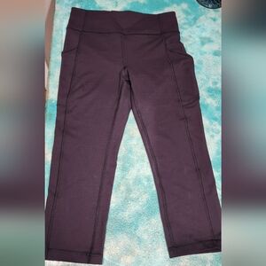 Lululemon Athletica Invigorate Crop, Black, Size 6. Well-loved.